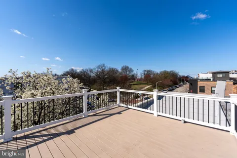 a view of balcony with furniture