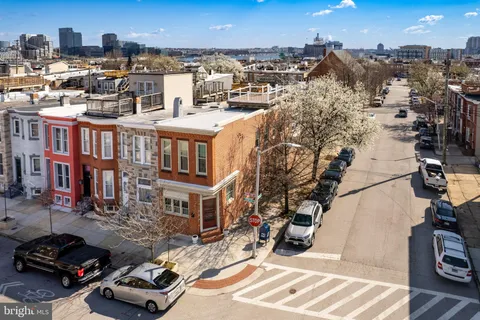 a city street filled with lots of tall buildings