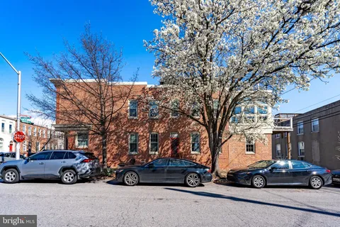 a car parked in front of a house