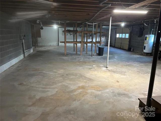 a view of a empty room with wooden floor