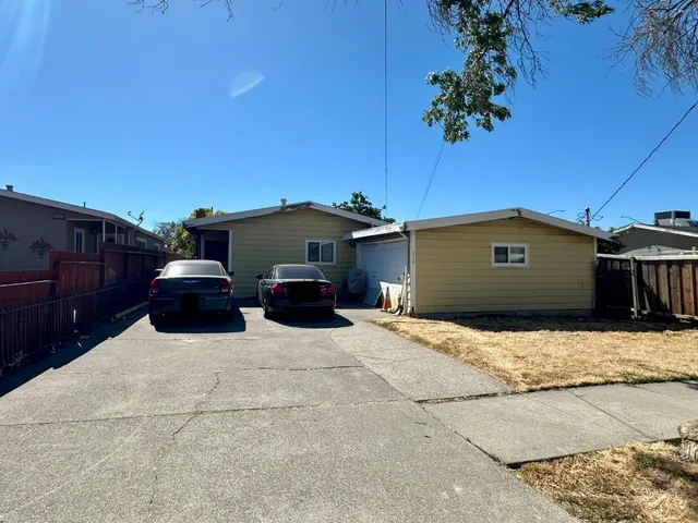 a view of a house with a patio