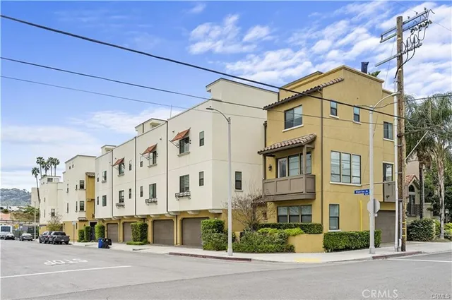 a view of a building with a street