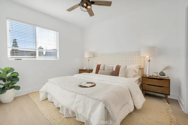 a bathroom with a double vanity sink mirror and shower