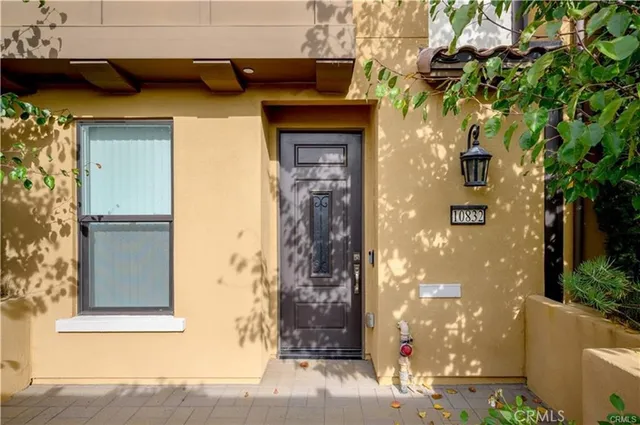 a front view of a house with a garage