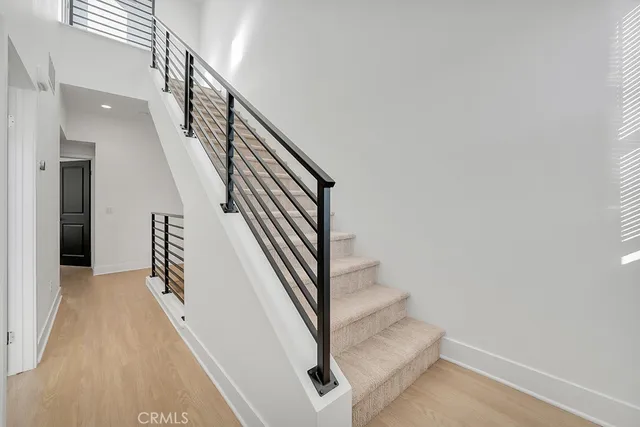 a view of a street with cars