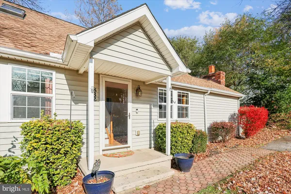 a front view of a house with patio