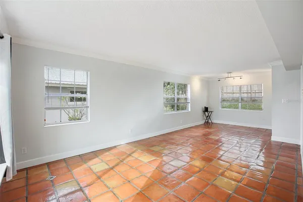 a view of an empty room and window