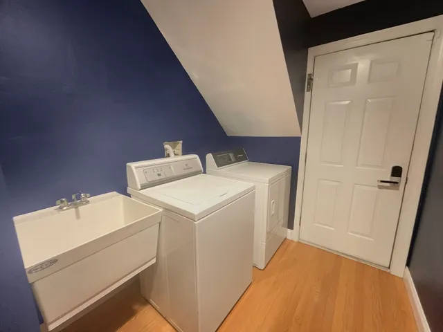 a utility room with dryer and washer