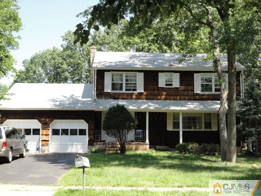 30 Meredith Road Piscataway, NJ 08854 - Photo 1 of 1 a front view of a house with a yard