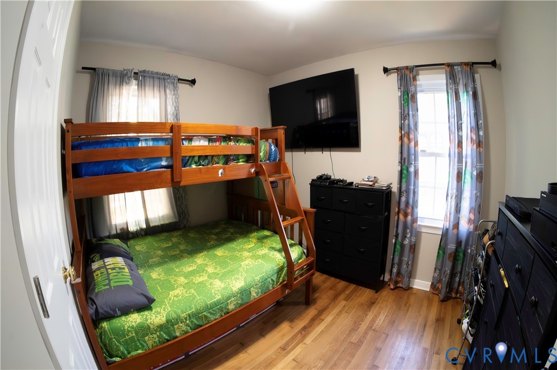 2718 Stacie Road Richmond, VA 23224 - Photo 26 of 50 Hardwood flooring complements light-toned walls
