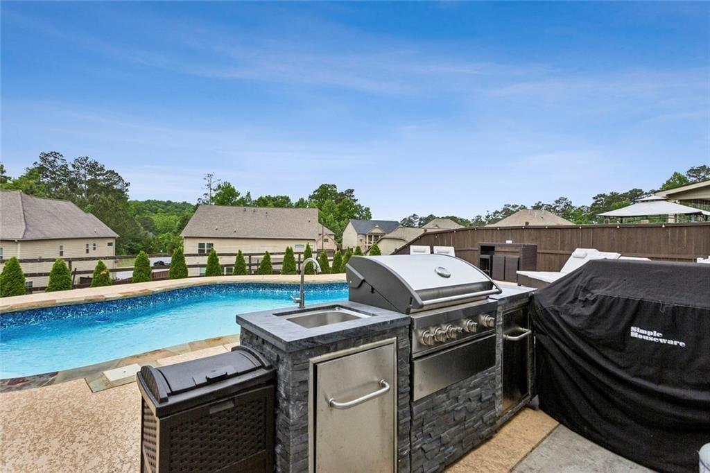 4846 Ralin Court Southwest Atlanta, GA 30331 - Photo 26 of 38 a view of a chairs and table on the terrace