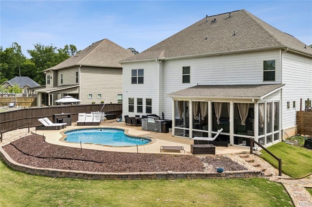 4846 Ralin Court Southwest Atlanta, GA 30331 - Photo 30 of 38 a view of a house with swimming pool and sitting area