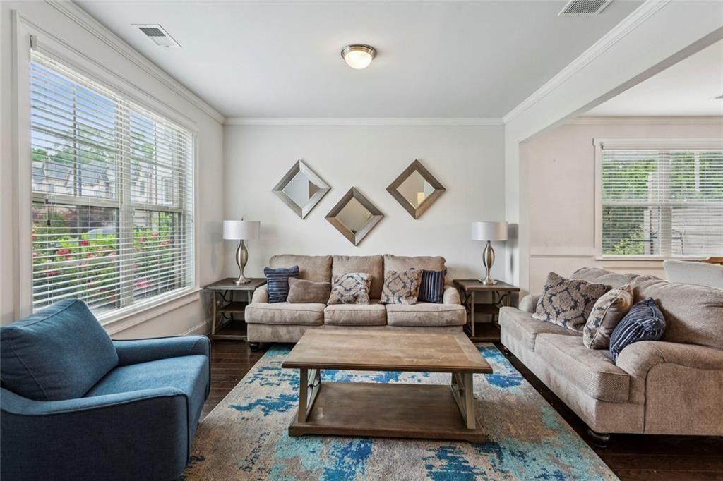 4846 Ralin Court Southwest Atlanta, GA 30331 - Photo 3 of 38 a living room with furniture and a large window