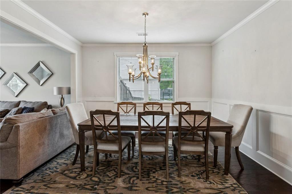 4846 Ralin Court Southwest Atlanta, GA 30331 - Photo 4 of 38 a view of a dining room with furniture window and outside view