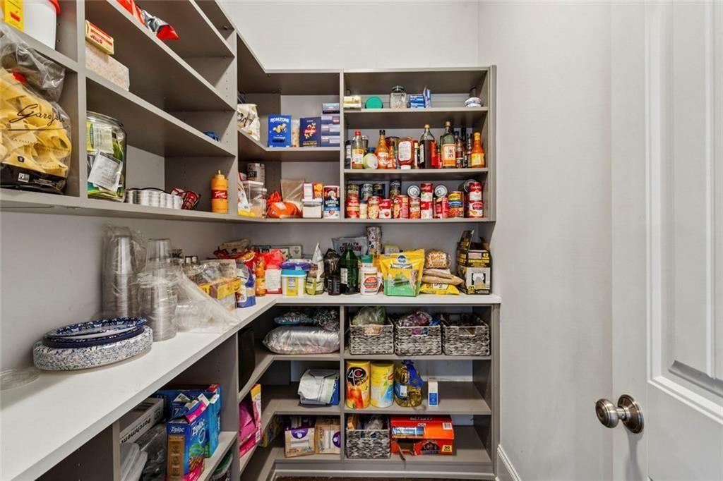 4846 Ralin Court Southwest Atlanta, GA 30331 - Photo 10 of 38 a room with storage and a shelf