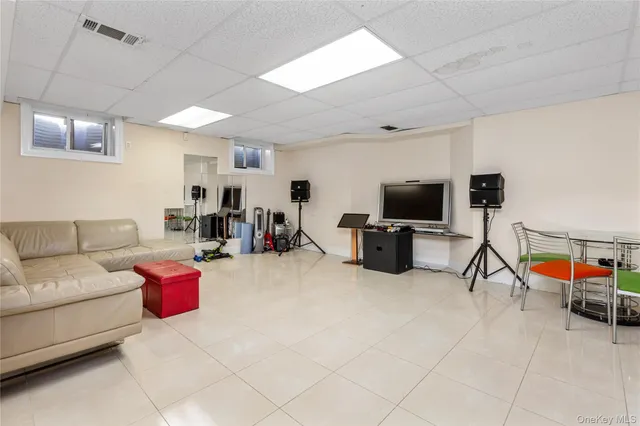 a bathroom with a sink a toilet and a shower