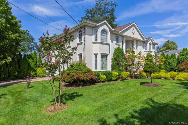 a view of a livingroom with furniture and a flat screen tv