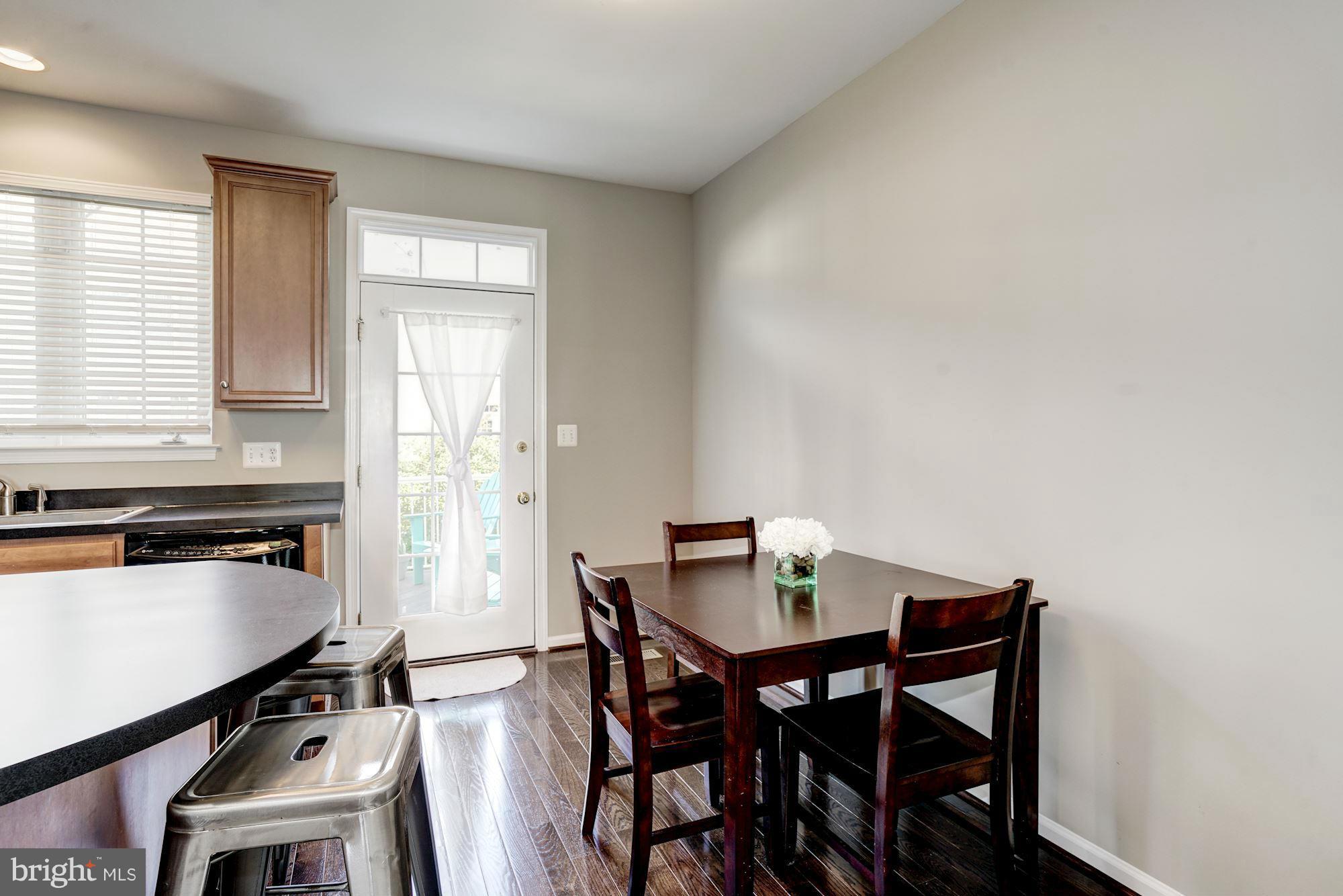 25013 Riding Center Drive Chantilly, VA 20152 - Photo 14 of 28 a view of a dining room with furniture and window