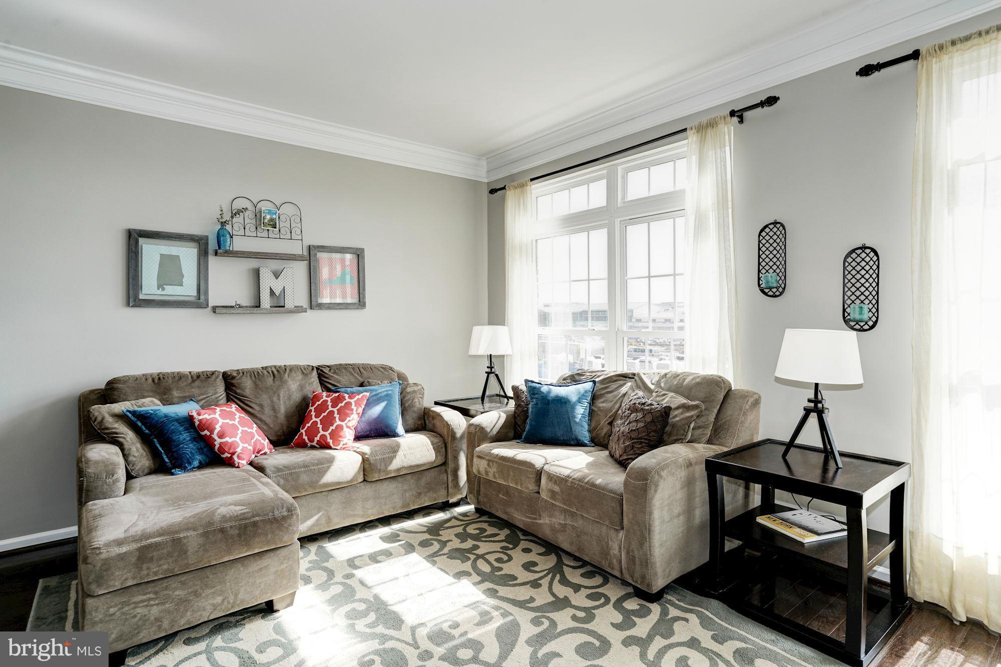 25013 Riding Center Drive Chantilly, VA 20152 - Photo 8 of 28 a living room with furniture and a large window
