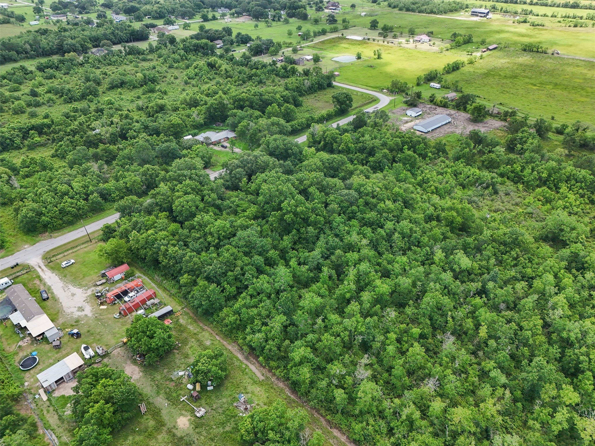 182 County Road 182 Liberty, TX 77575 - Photo 4 of 9 view of outdoor space and yard