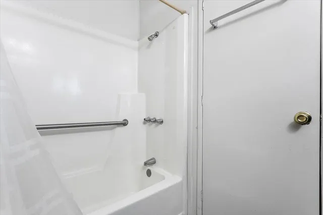 a bathroom with a bathtub