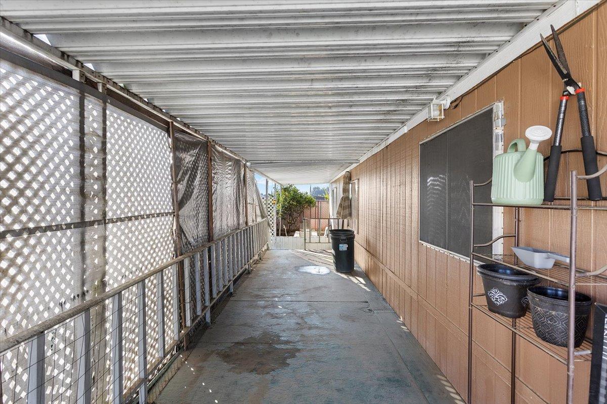 4837 Faith Home Road, Unit 177 Ceres, CA 95307 - Photo 25 of 31 a view of a porch