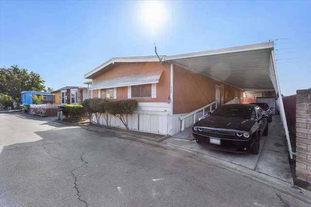 a car parked in front of a house
