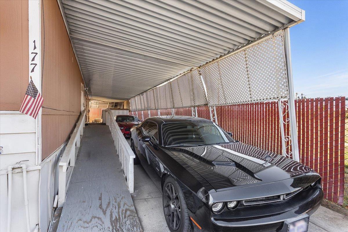 4837 Faith Home Road, Unit 177 Ceres, CA 95307 - Photo 4 of 31 a view of entryway and hall with wooden floor