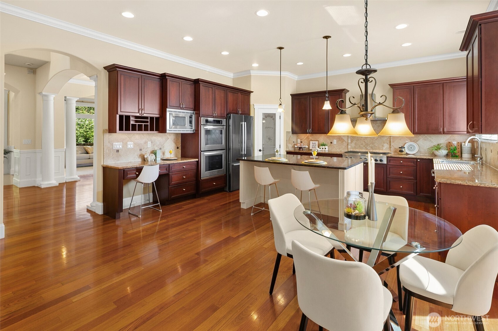 14248 Southeast Allen Rd. Bellevue, WA 98006 - Photo 11 of 40 a large kitchen with a table and chairs