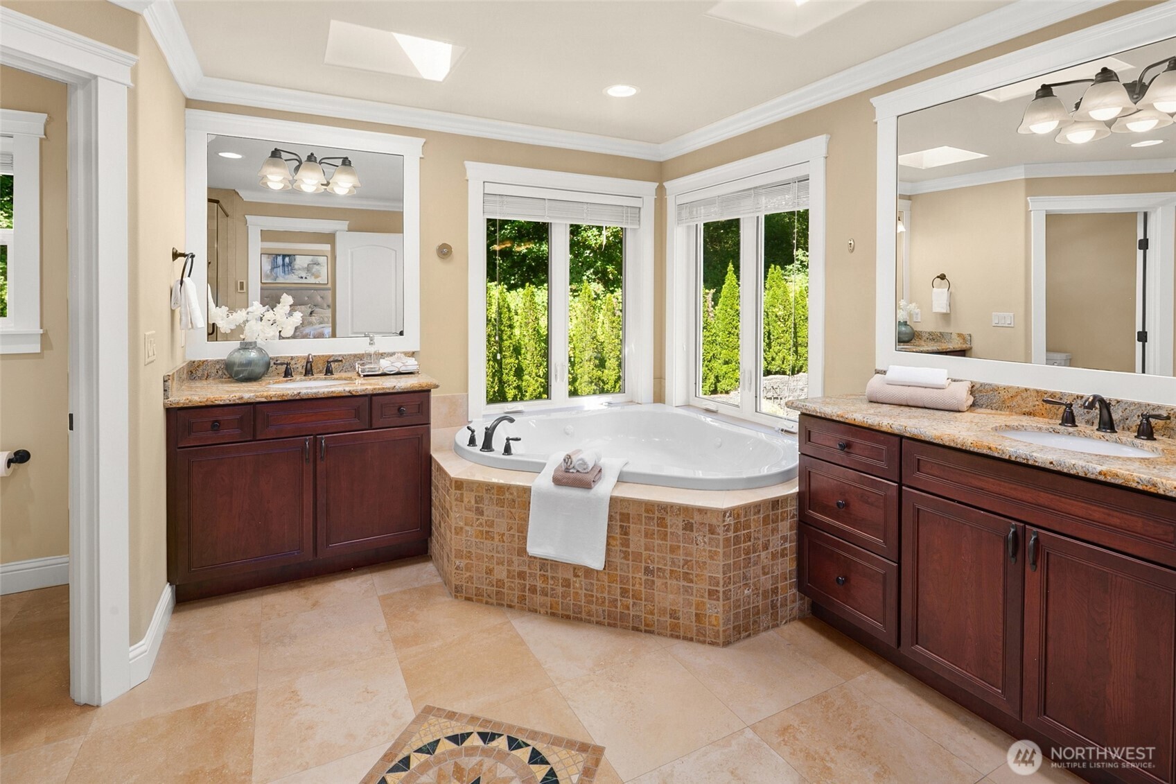 14248 Southeast Allen Rd. Bellevue, WA 98006 - Photo 23 of 40 a spacious bathroom with a tub sink and mirror