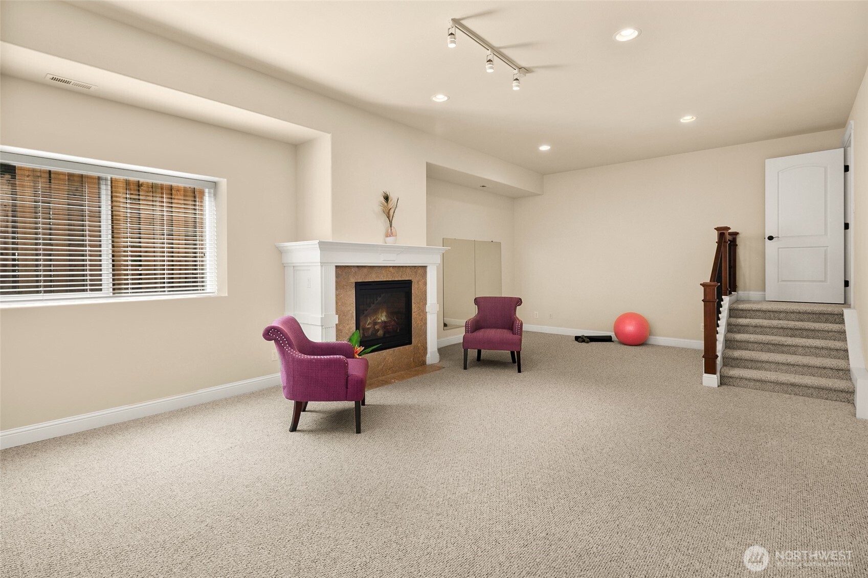 14248 Southeast Allen Rd. Bellevue, WA 98006 - Photo 29 of 40 a living room with furniture and a fireplace