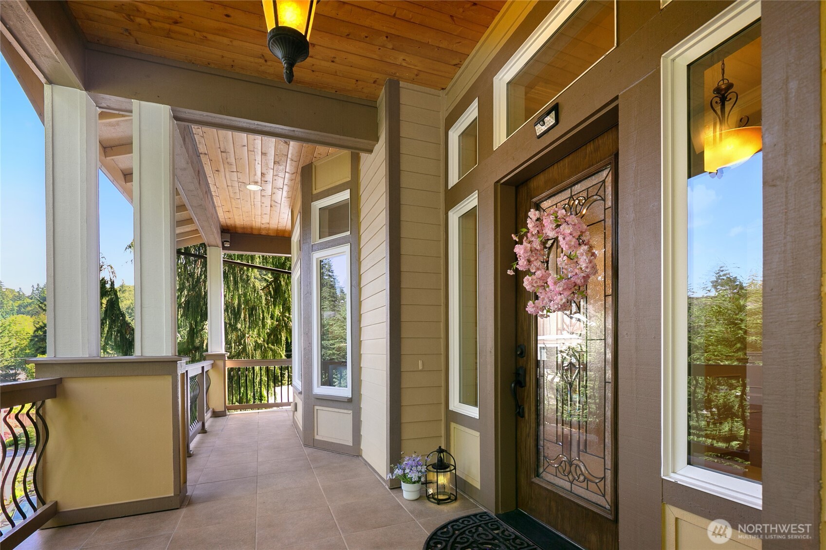 14248 Southeast Allen Rd. Bellevue, WA 98006 - Photo 3 of 40 a view of a door and wooden floor