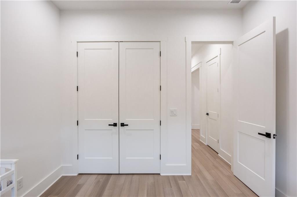 246 Pleasant Hill Church Road Northeast Winder, GA 30680 - Photo 31 of 64 a view of a hallway with wooden floor