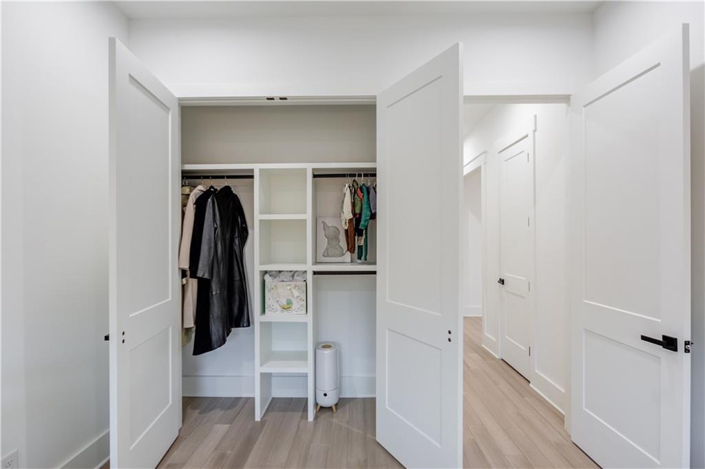 246 Pleasant Hill Church Road Northeast Winder, GA 30680 - Photo 32 of 64 a view of walk in closet with clothes and shoes