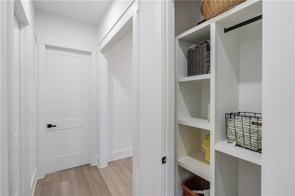 246 Pleasant Hill Church Road Northeast Winder, GA 30680 - Photo 33 of 64 a view of walk in closet with clothes