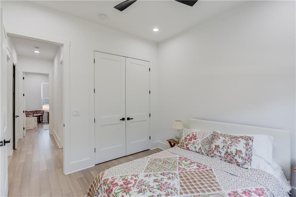 246 Pleasant Hill Church Road Northeast Winder, GA 30680 - Photo 35 of 64 a bedroom with a bed and a walk in closet