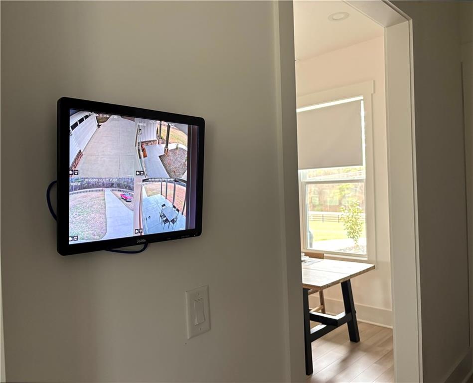 246 Pleasant Hill Church Road Northeast Winder, GA 30680 - Photo 40 of 64 a view of a small space with wooden floor and a window