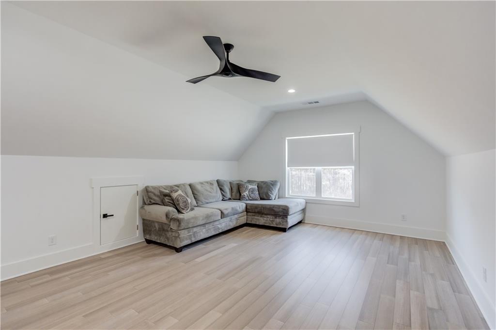 246 Pleasant Hill Church Road Northeast Winder, GA 30680 - Photo 41 of 64 a living room with furniture and a wooden floor