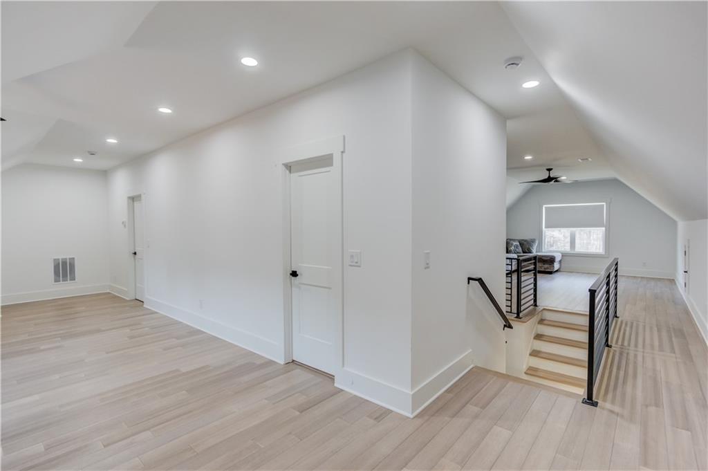 246 Pleasant Hill Church Road Northeast Winder, GA 30680 - Photo 43 of 64 a view of a room with wooden floor and stairs
