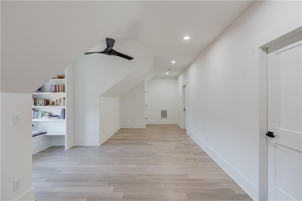 246 Pleasant Hill Church Road Northeast Winder, GA 30680 - Photo 44 of 64 a view of a hallway with wooden shelves