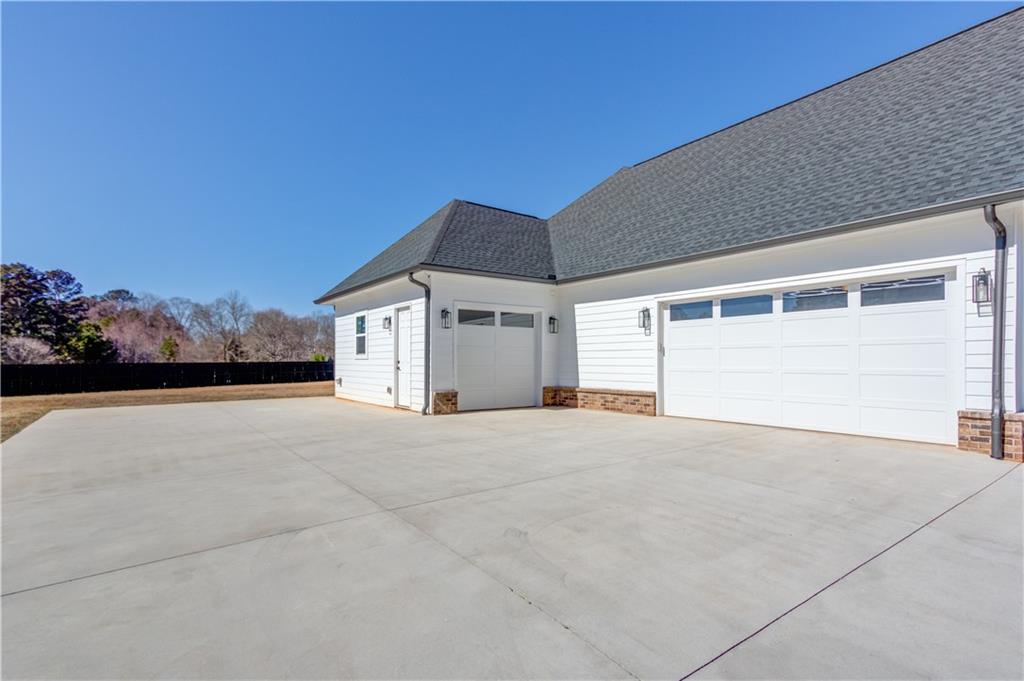 246 Pleasant Hill Church Road Northeast Winder, GA 30680 - Photo 61 of 64 a view of house with outdoor space and parking