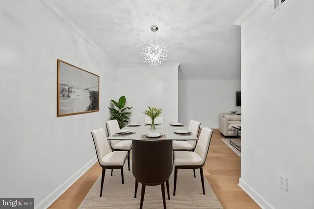 a bedroom with a large bed and a tv