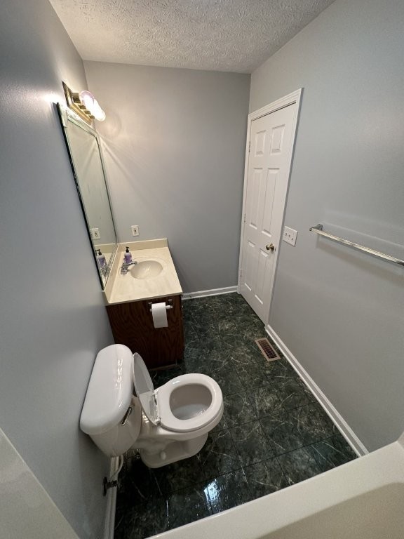 108 Roberts Road Shelbyville, TN 37160 - Photo 8 of 16 a bathroom with a toilet sink and mirror