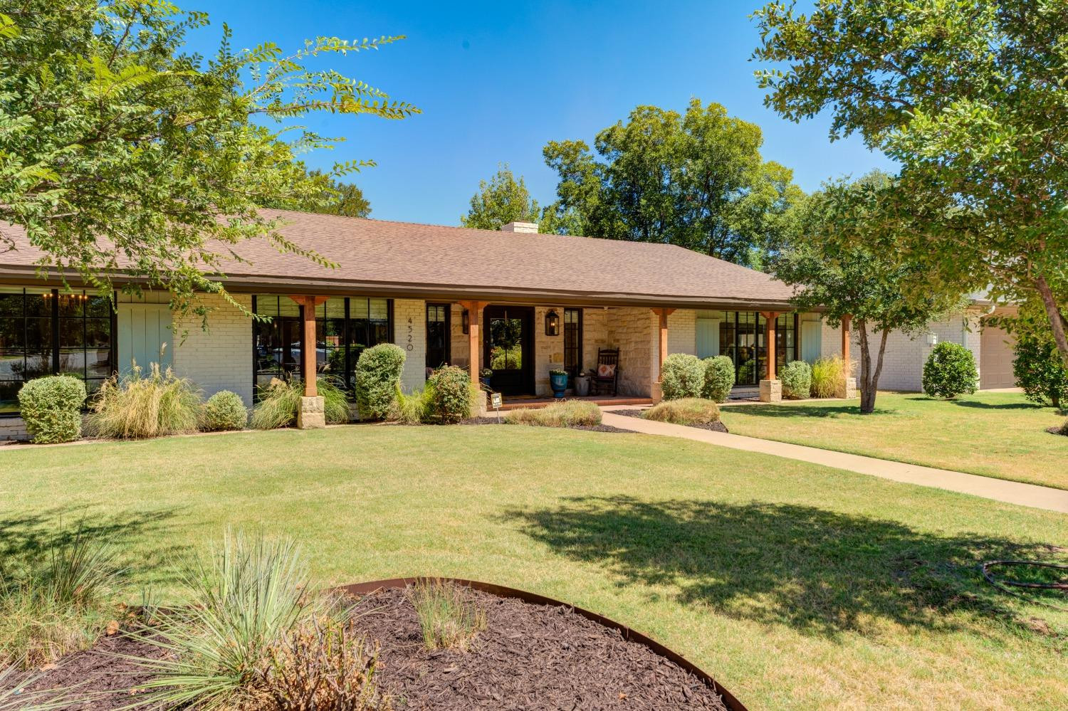 a view of a house with a swimming pool