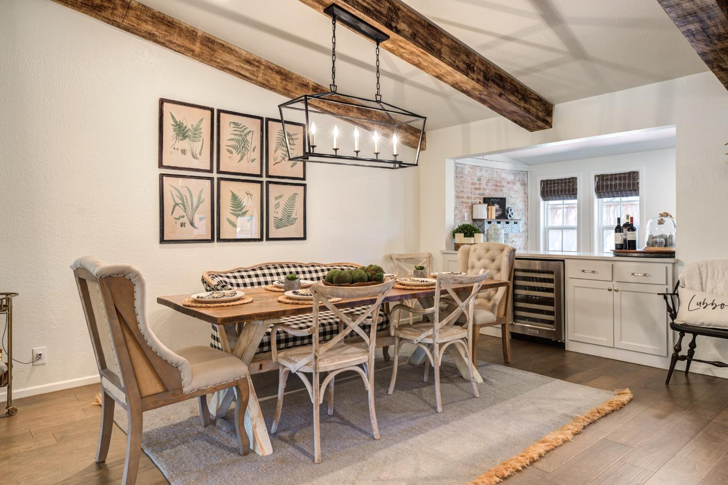 4520 8th Street Lubbock, TX 79416 - Photo 25 of 49 a view of a dining room with furniture and wooden floor