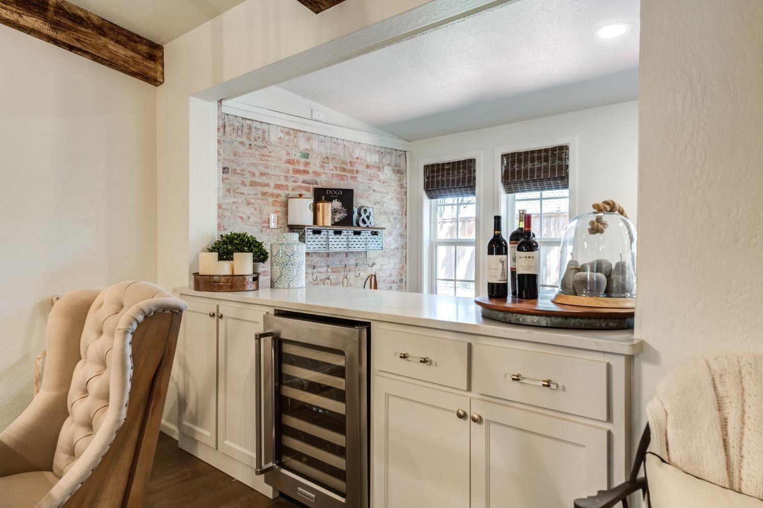 4520 8th Street Lubbock, TX 79416 - Photo 26 of 49 a kitchen with cabinets and window