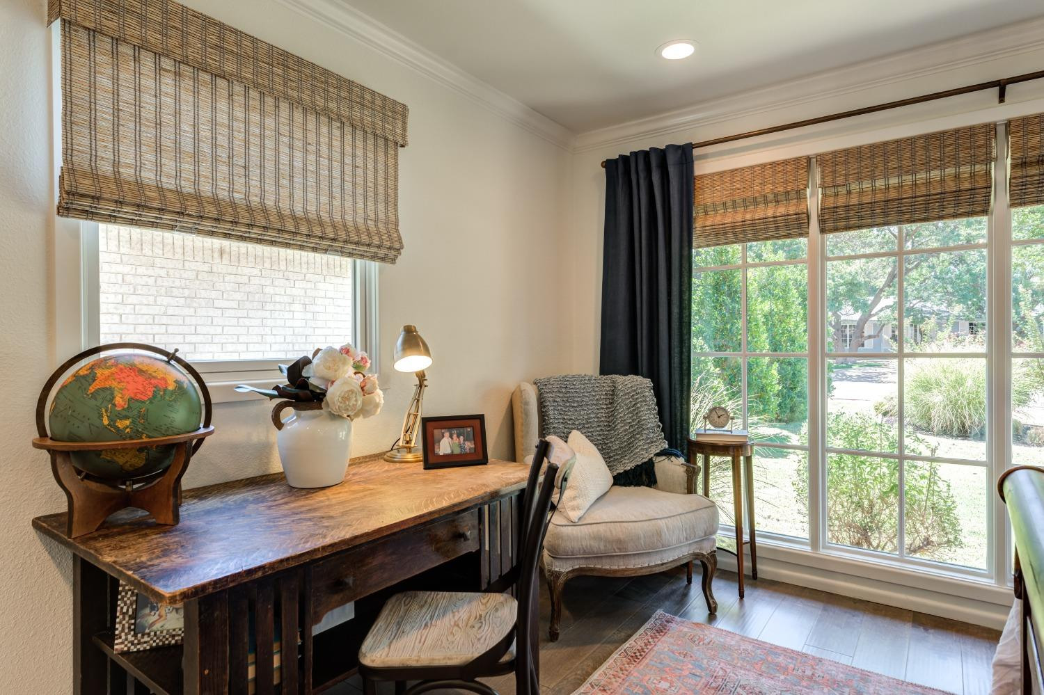 4520 8th Street Lubbock, TX 79416 - Photo 39 of 49 a view of a dining room with furniture and wooden floor