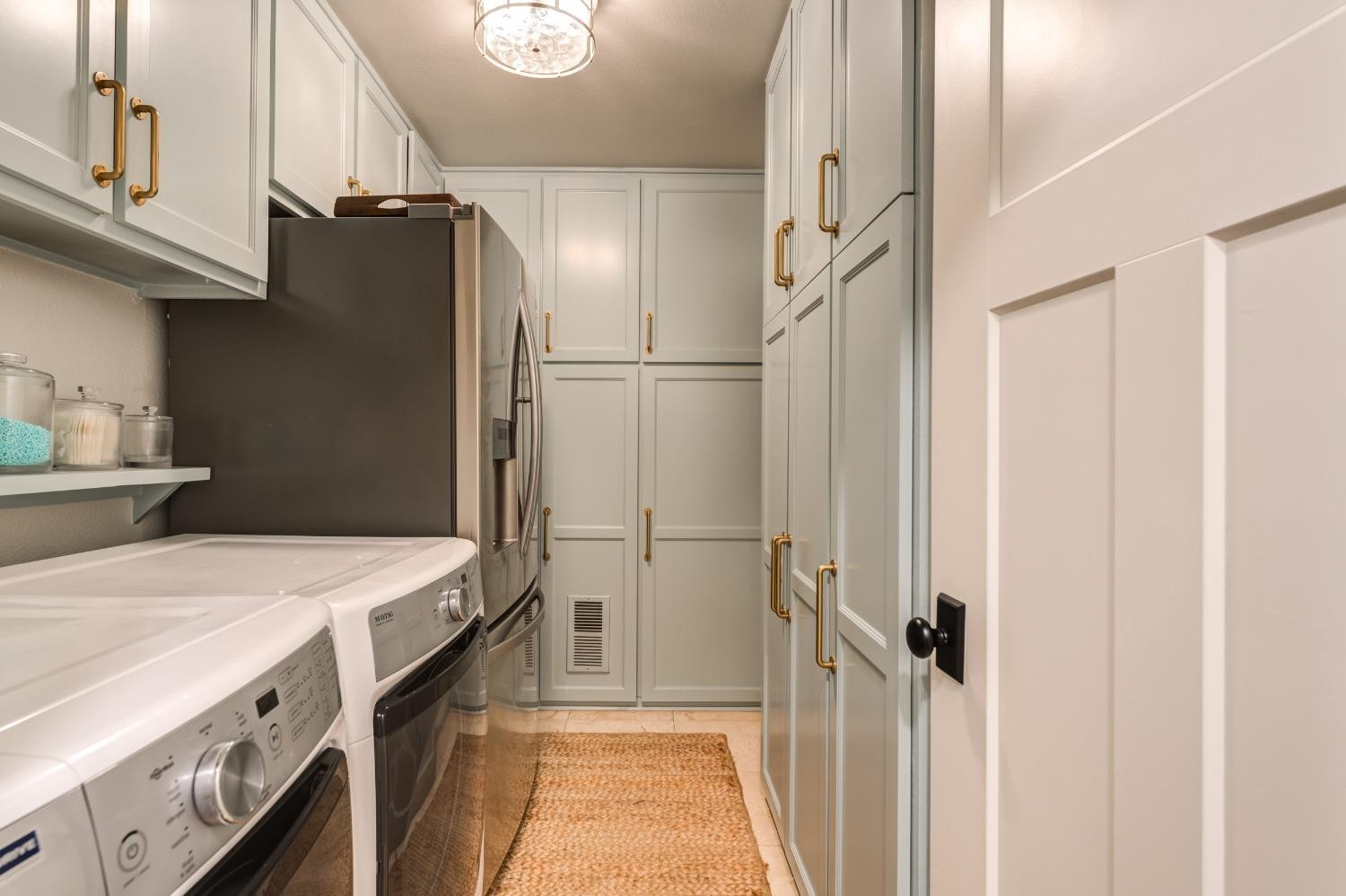 4520 8th Street Lubbock, TX 79416 - Photo 44 of 49 a kitchen with a refrigerator and a sink