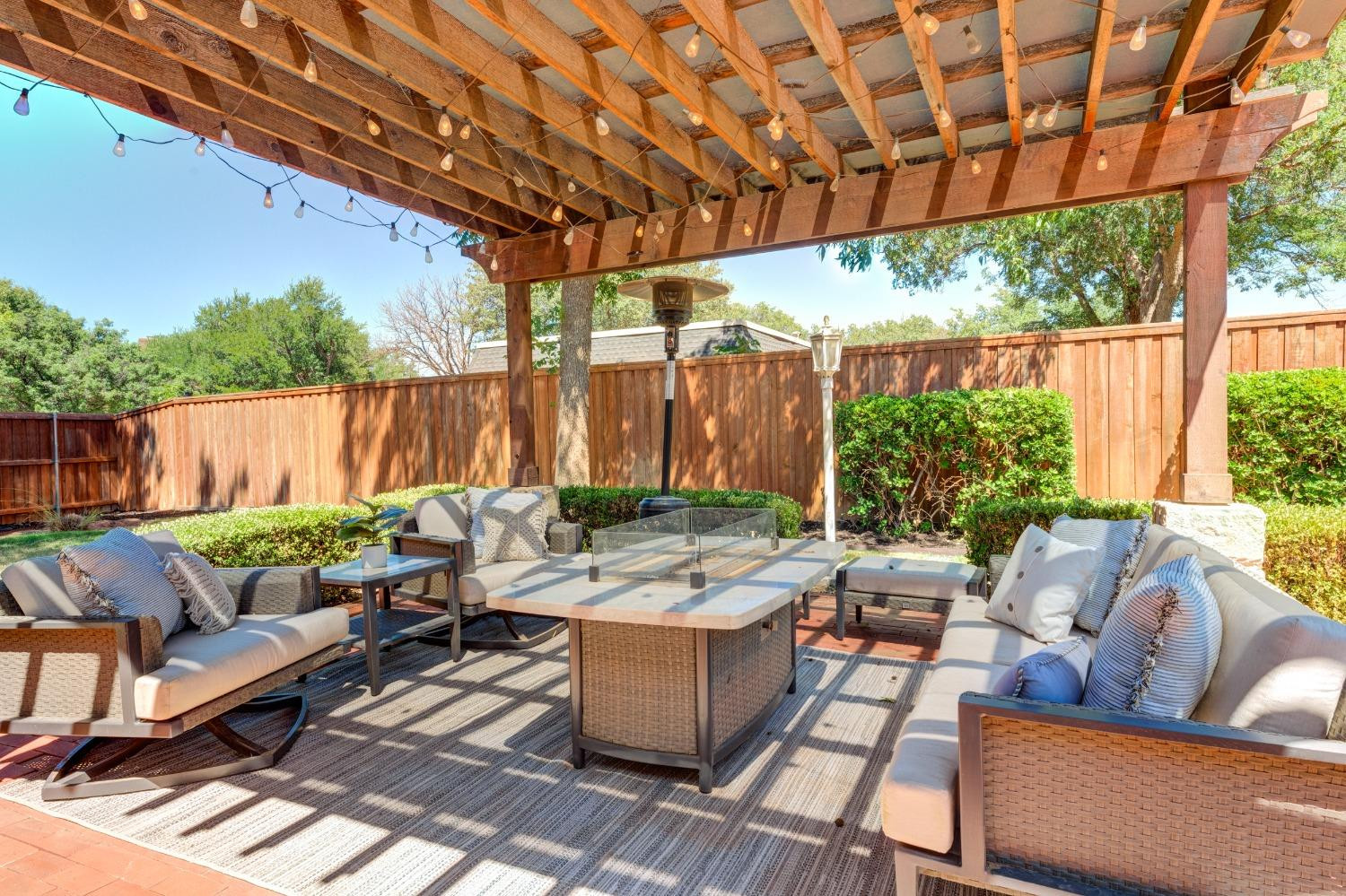 4520 8th Street Lubbock, TX 79416 - Photo 46 of 49 a outdoor living space with furniture and garden view