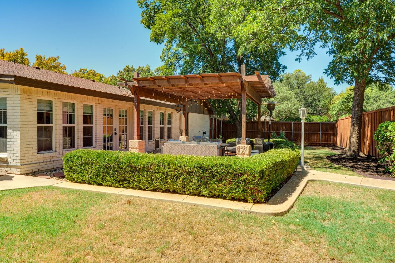 4520 8th Street Lubbock, TX 79416 - Photo 47 of 49 front view of a house with a yard
